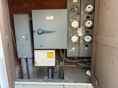 Old multi-meter electrical service before 400 amp upgrade in Pasadena CA